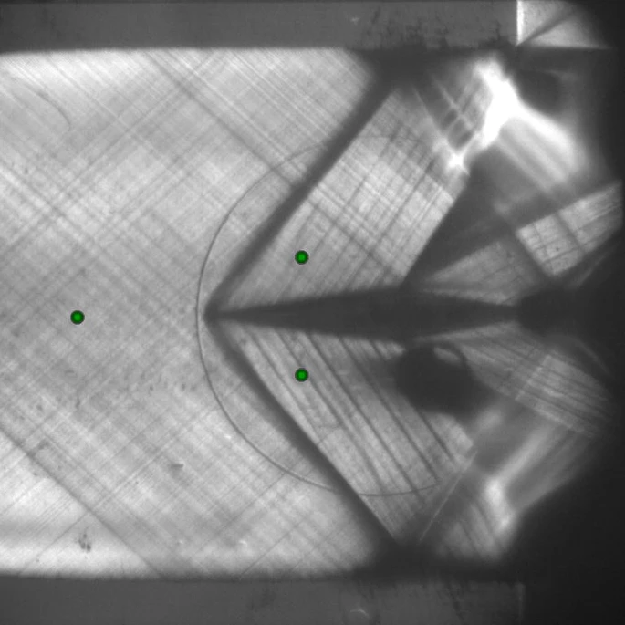 Schlieren visualization of the oblique shock by